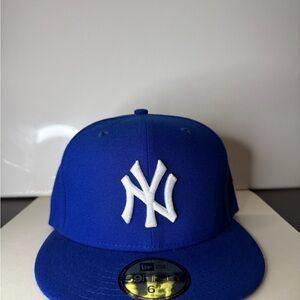 New Era Royal Blue Cap with White Emblem